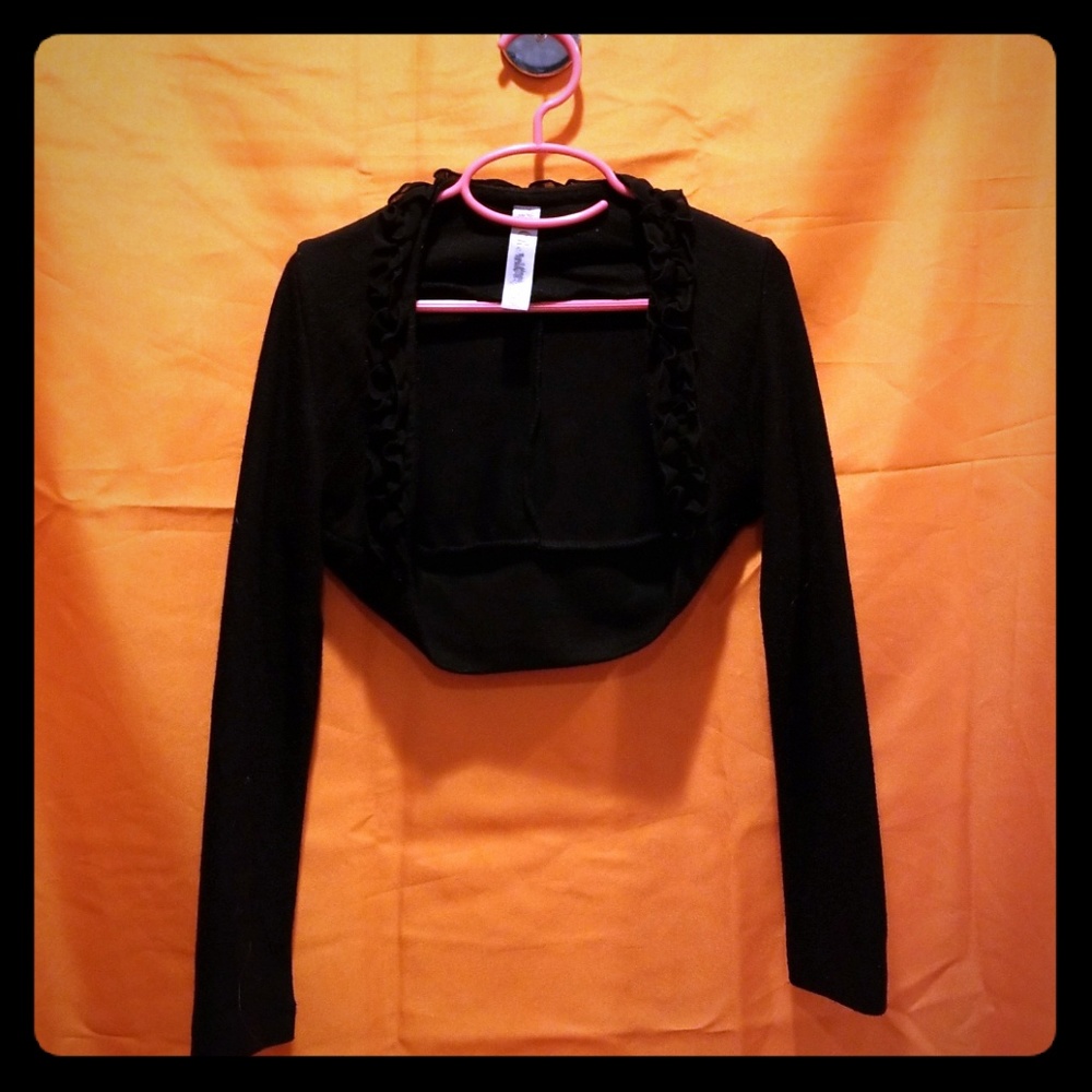 Black shrug with ruffle collar